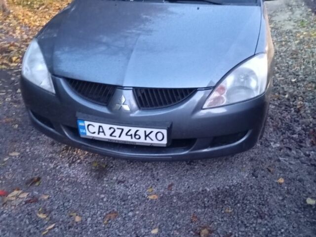 Мицубиси Лансер 2004 в Черкассах на Automoto.ua Серый Мицубиси Лансер, объемом двигателя 1.6 л и пробегом 313 тыс. км за 4800 $, фото 1 на Automoto.ua