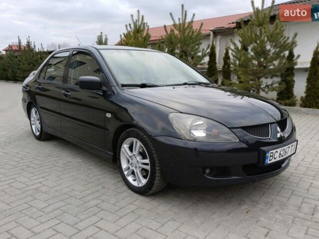 Сірий Міцубісі Lancer, об'ємом двигуна 2 л та пробігом 299 тис. км за 4650 $, фото 1 на Automoto.ua