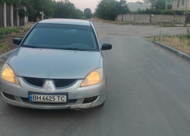 Сірий Міцубісі Lancer, об'ємом двигуна 1.6 л та пробігом 2 тис. км за 1661 $, фото 1 на Automoto.ua
