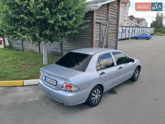 Сірий Міцубісі Lancer, об'ємом двигуна 1.3 л та пробігом 280 тис. км за 3700 $, фото 1 на Automoto.ua