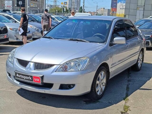Серый Мицубиси Лансер, объемом двигателя 1.6 л и пробегом 284 тыс. км за 4530 $, фото 1 на Automoto.ua