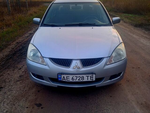 Сірий Міцубісі Lancer, об'ємом двигуна 1.6 л та пробігом 280 тис. км за 3700 $, фото 1 на Automoto.ua