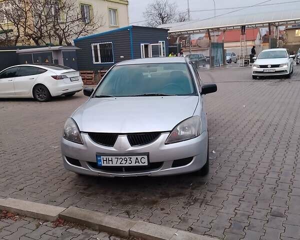 Сірий Міцубісі Lancer, об'ємом двигуна 1.3 л та пробігом 280 тис. км за 3500 $, фото 1 на Automoto.ua