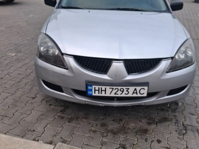 Сірий Міцубісі Lancer, об'ємом двигуна 1 л та пробігом 289 тис. км за 3500 $, фото 1 на Automoto.ua