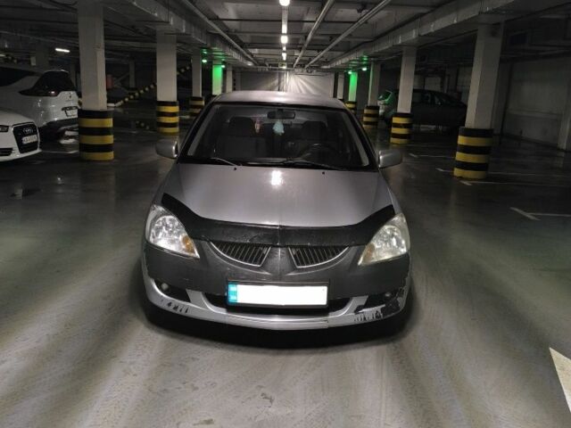 Серый Мицубиси Лансер, объемом двигателя 1.6 л и пробегом 3 тыс. км за 3000 $, фото 1 на Automoto.ua