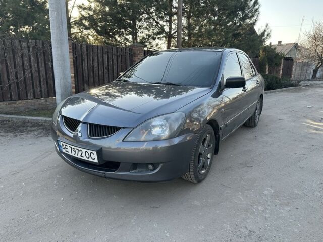 Серый Мицубиси Лансер, объемом двигателя 1.6 л и пробегом 270 тыс. км за 3950 $, фото 1 на Automoto.ua