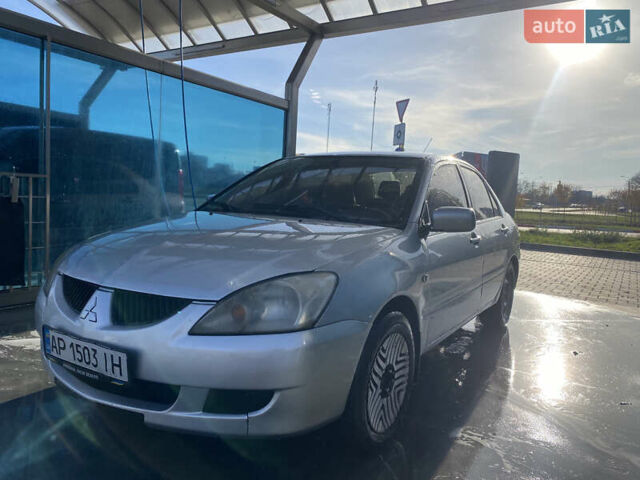 Сірий Міцубісі Lancer, об'ємом двигуна 1.3 л та пробігом 376 тис. км за 3700 $, фото 1 на Automoto.ua
