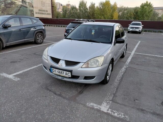 Сірий Міцубісі Lancer, об'ємом двигуна 1.6 л та пробігом 239 тис. км за 2508 $, фото 1 на Automoto.ua