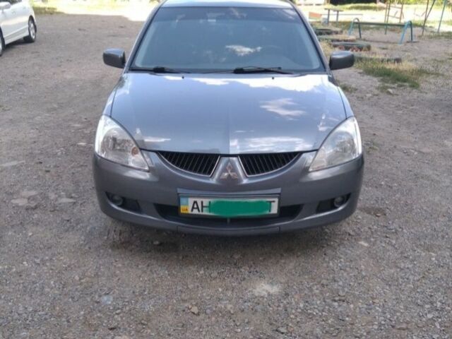 Серый Мицубиси Лансер, объемом двигателя 0 л и пробегом 198 тыс. км за 4350 $, фото 1 на Automoto.ua
