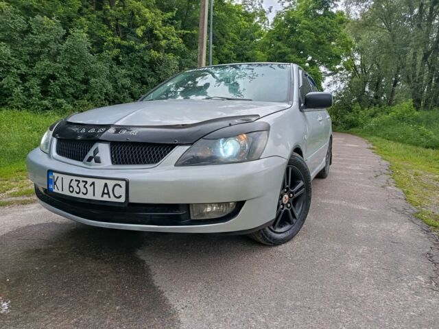 Сірий Міцубісі Lancer, об'ємом двигуна 2 л та пробігом 240 тис. км за 3500 $, фото 1 на Automoto.ua