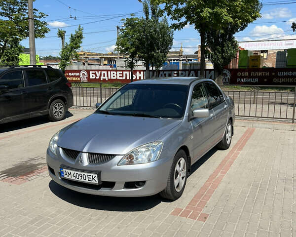 Сірий Міцубісі Lancer, об'ємом двигуна 1.6 л та пробігом 210 тис. км за 4500 $, фото 1 на Automoto.ua