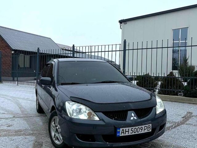 Сірий Міцубісі Lancer, об'ємом двигуна 1.6 л та пробігом 27500 тис. км за 4250 $, фото 1 на Automoto.ua