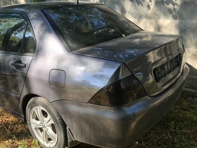 Сірий Міцубісі Lancer, об'ємом двигуна 1.6 л та пробігом 240 тис. км за 1902 $, фото 1 на Automoto.ua