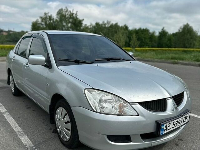 Сірий Міцубісі Lancer, об'ємом двигуна 1.3 л та пробігом 408 тис. км за 3499 $, фото 1 на Automoto.ua