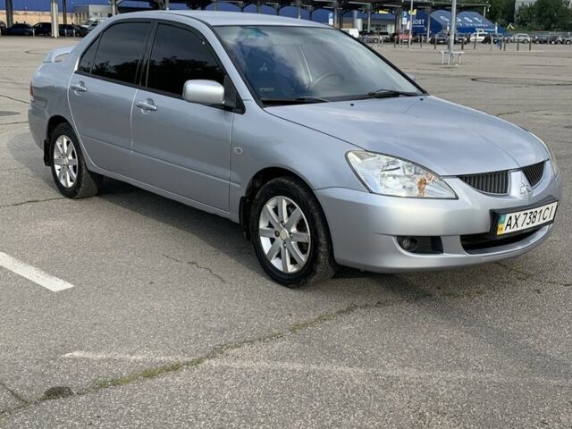 Сірий Міцубісі Lancer, об'ємом двигуна 1.6 л та пробігом 285 тис. км за 4450 $, фото 1 на Automoto.ua
