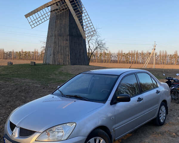Сірий Міцубісі Lancer, об'ємом двигуна 1.6 л та пробігом 375 тис. км за 3550 $, фото 1 на Automoto.ua