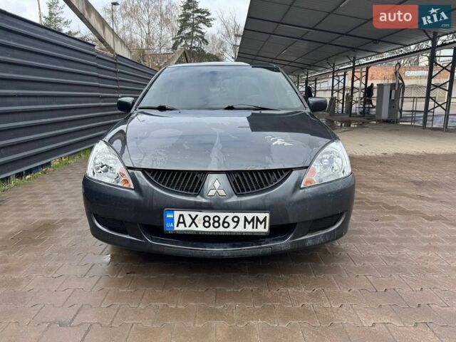 Сірий Міцубісі Lancer, об'ємом двигуна 1.58 л та пробігом 280 тис. км за 3700 $, фото 1 на Automoto.ua