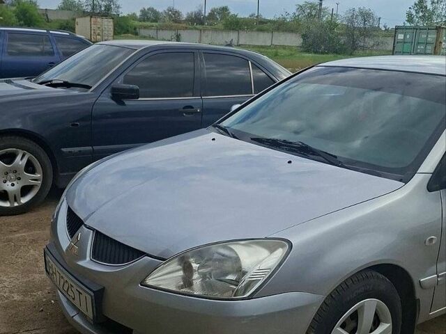 Сірий Міцубісі Lancer, об'ємом двигуна 1.58 л та пробігом 160 тис. км за 3500 $, фото 1 на Automoto.ua