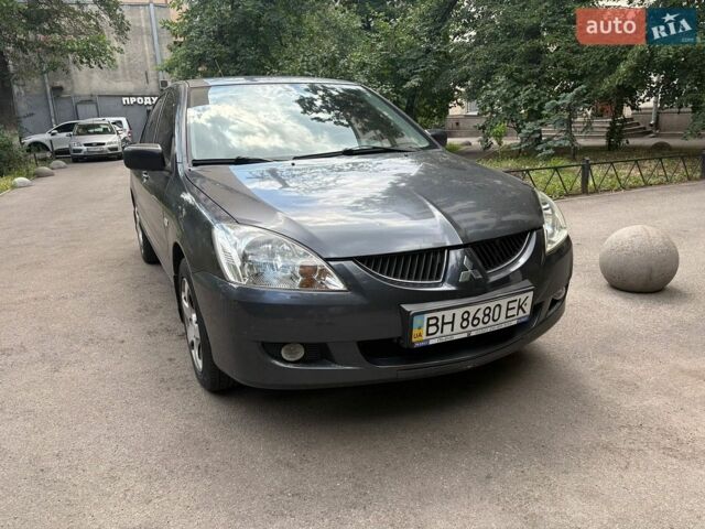 Сірий Міцубісі Lancer, об'ємом двигуна 1.6 л та пробігом 191 тис. км за 2400 $, фото 1 на Automoto.ua