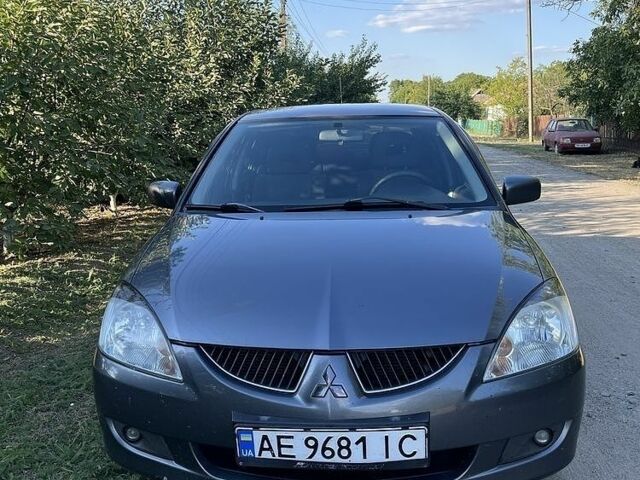 Сірий Міцубісі Lancer, об'ємом двигуна 1.6 л та пробігом 320 тис. км за 3602 $, фото 1 на Automoto.ua
