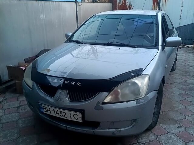 Сірий Міцубісі Lancer, об'ємом двигуна 1.6 л та пробігом 320 тис. км за 2600 $, фото 1 на Automoto.ua