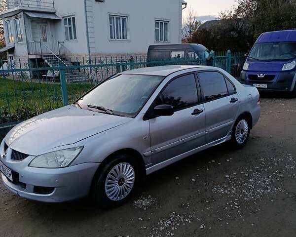 Мицубиси Лансер 2004 в Черновцах на Automoto.ua Серый Мицубиси Лансер, объемом двигателя 1.58 л и пробегом 439 тыс. км за 2750 $, фото 1 на Automoto.ua