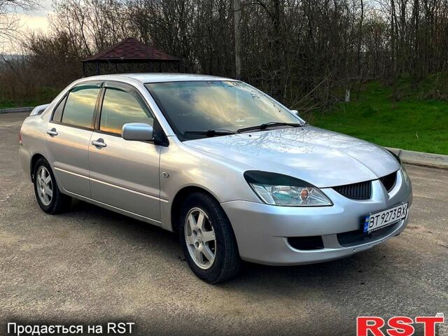 Сірий Міцубісі Lancer, об'ємом двигуна 1.6 л та пробігом 300 тис. км за 3600 $, фото 1 на Automoto.ua