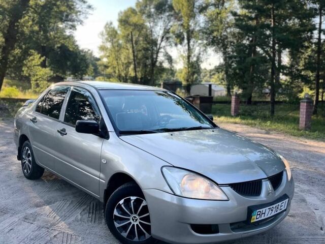 Сірий Міцубісі Lancer, об'ємом двигуна 1.3 л та пробігом 3 тис. км за 2476 $, фото 1 на Automoto.ua