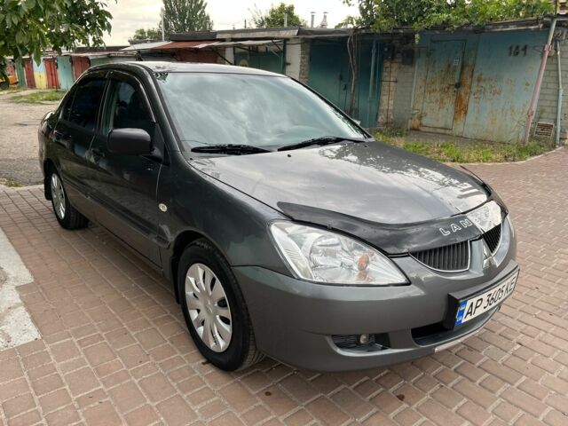 Сірий Міцубісі Lancer, об'ємом двигуна 1.6 л та пробігом 218 тис. км за 3650 $, фото 1 на Automoto.ua