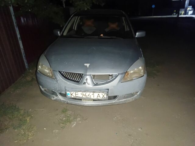 Сірий Міцубісі Lancer, об'ємом двигуна 1.6 л та пробігом 300 тис. км за 1352 $, фото 1 на Automoto.ua