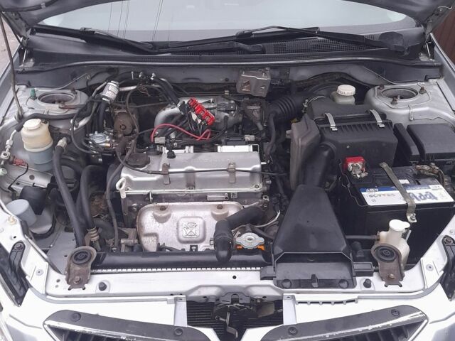 Серый Мицубиси Лансер, объемом двигателя 1.6 л и пробегом 290 тыс. км за 4000 $, фото 1 на Automoto.ua