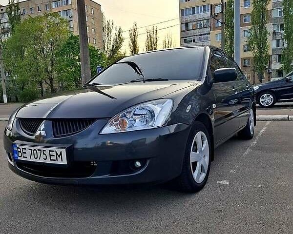 Сірий Міцубісі Lancer, об'ємом двигуна 1.6 л та пробігом 142 тис. км за 4900 $, фото 1 на Automoto.ua