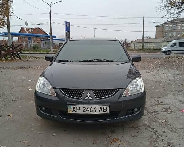 Сірий Міцубісі Lancer, об'ємом двигуна 1.6 л та пробігом 300 тис. км за 3600 $, фото 1 на Automoto.ua
