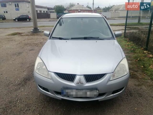 Міцубісі Lancer 2004 у Харкові на Automoto.ua Сірий Міцубісі Lancer, об'ємом двигуна 1.58 л та пробігом 248 тис. км за 3550 $, фото 1 на Automoto.ua