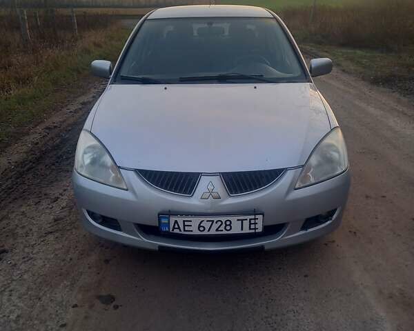 Сірий Міцубісі Lancer, об'ємом двигуна 1.6 л та пробігом 280 тис. км за 3800 $, фото 1 на Automoto.ua