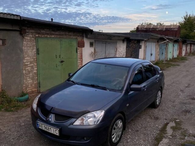 Сірий Міцубісі Lancer, об'ємом двигуна 1.6 л та пробігом 307 тис. км за 3700 $, фото 1 на Automoto.ua