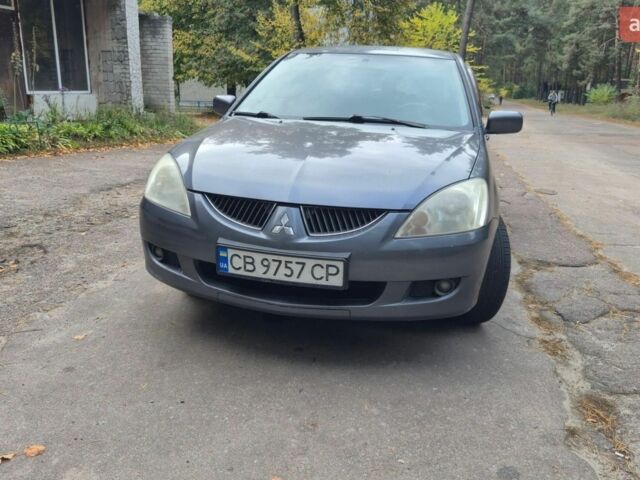 Сірий Міцубісі Lancer, об'ємом двигуна 1.6 л та пробігом 310 тис. км за 3700 $, фото 1 на Automoto.ua