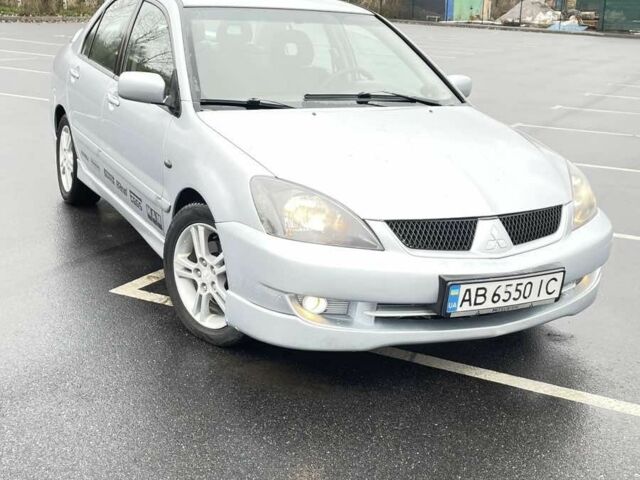 Сірий Міцубісі Lancer, об'ємом двигуна 2 л та пробігом 1 тис. км за 3500 $, фото 1 на Automoto.ua