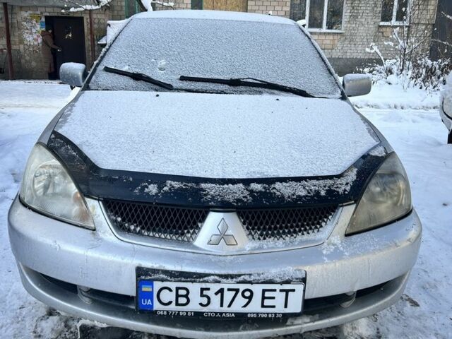 Серый Мицубиси Лансер, объемом двигателя 1.6 л и пробегом 1 тыс. км за 2500 $, фото 1 на Automoto.ua