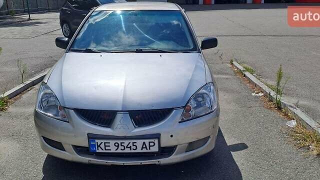 Сірий Міцубісі Lancer, об'ємом двигуна 1.3 л та пробігом 197 тис. км за 2700 $, фото 1 на Automoto.ua