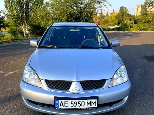 Серый Мицубиси Лансер, объемом двигателя 1.6 л и пробегом 282 тыс. км за 4100 $, фото 1 на Automoto.ua