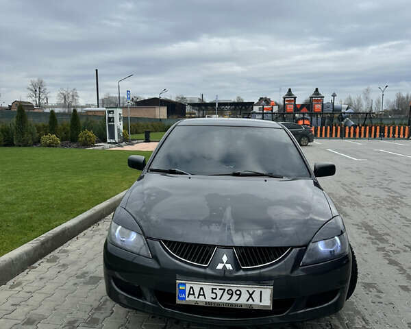 Серый Мицубиси Лансер, объемом двигателя 1.58 л и пробегом 300 тыс. км за 3500 $, фото 1 на Automoto.ua