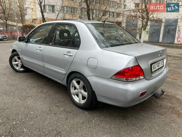 Сірий Міцубісі Lancer, об'ємом двигуна 1.58 л та пробігом 281 тис. км за 3250 $, фото 1 на Automoto.ua