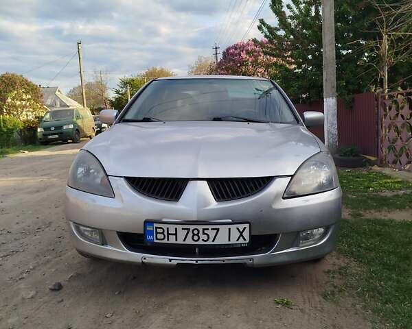 Серый Мицубиси Лансер, объемом двигателя 1.6 л и пробегом 199 тыс. км за 3300 $, фото 1 на Automoto.ua