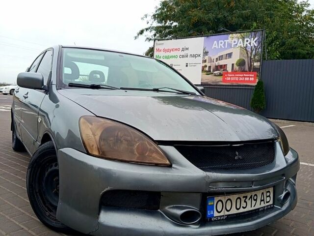 Сірий Міцубісі Lancer, об'ємом двигуна 1.6 л та пробігом 0 тис. км за 3000 $, фото 1 на Automoto.ua