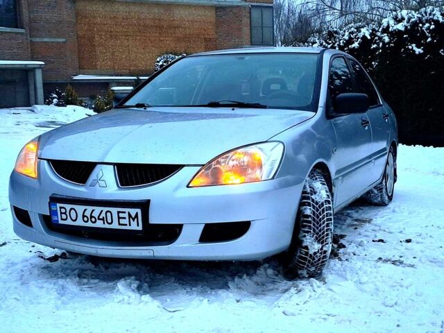 Сірий Міцубісі Lancer, об'ємом двигуна 1.6 л та пробігом 315 тис. км за 3450 $, фото 1 на Automoto.ua