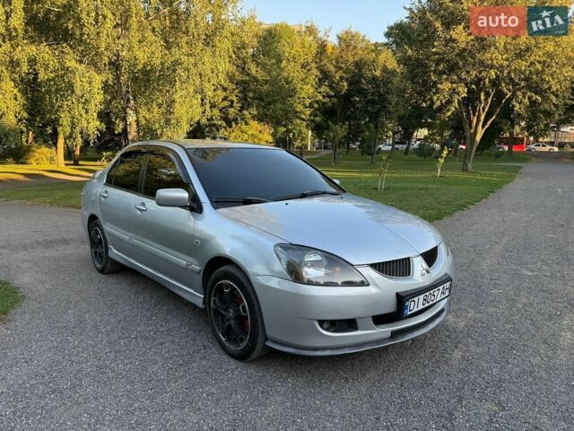 Сірий Міцубісі Lancer, об'ємом двигуна 2 л та пробігом 360 тис. км за 3400 $, фото 1 на Automoto.ua