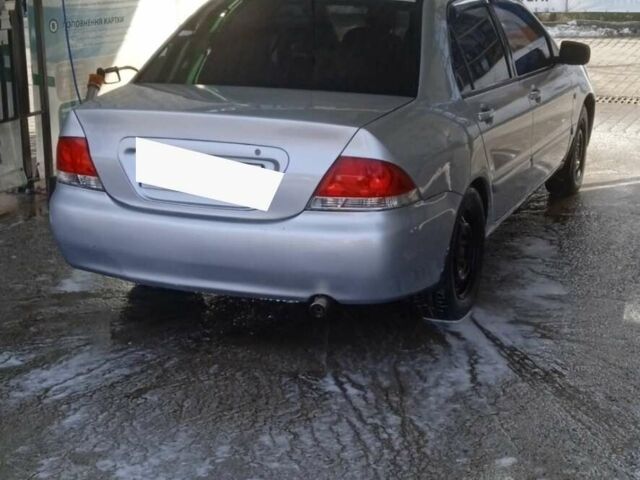 Сірий Міцубісі Lancer, об'ємом двигуна 1.59 л та пробігом 60 тис. км за 2500 $, фото 1 на Automoto.ua