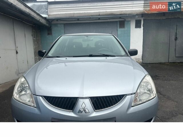 Сірий Міцубісі Lancer, об'ємом двигуна 1.6 л та пробігом 228 тис. км за 2850 $, фото 1 на Automoto.ua