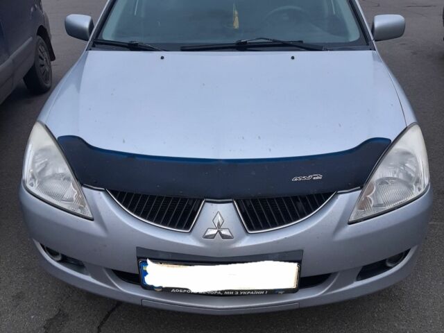 Сірий Міцубісі Lancer, об'ємом двигуна 1.6 л та пробігом 27 тис. км за 4200 $, фото 1 на Automoto.ua